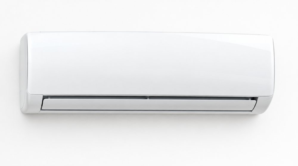 A white wall-mounted split air conditioning unit